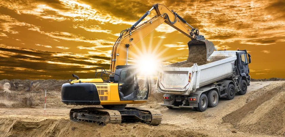 Excavator is digging on construction site Stock Photos