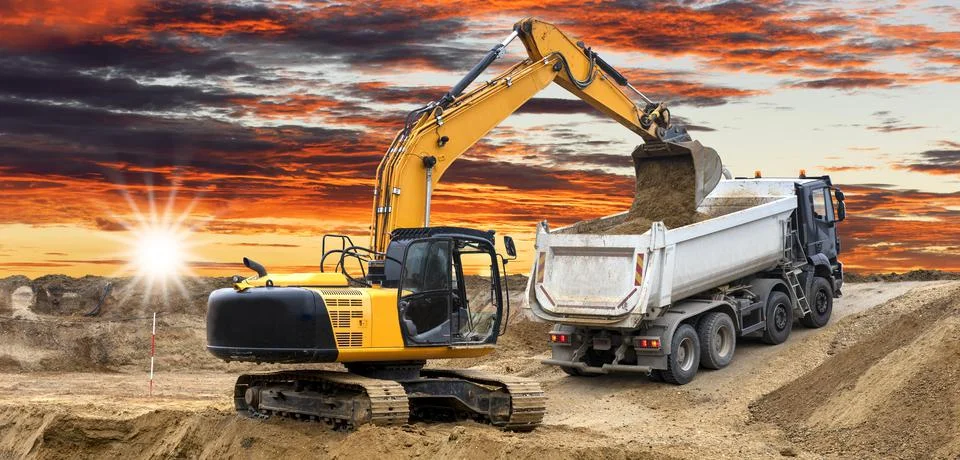 Excavator is digging on construction site Stock Photos