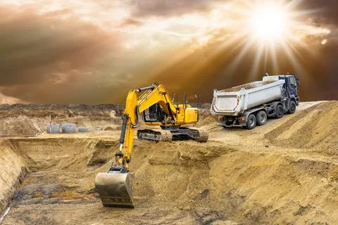 Excavator is digging on construction site Stock Photos