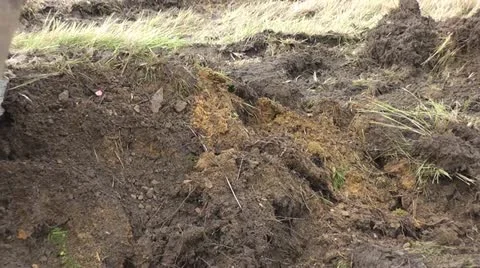 Excavator digging at a construction site - view of the big shovel Stock Footage 22001296