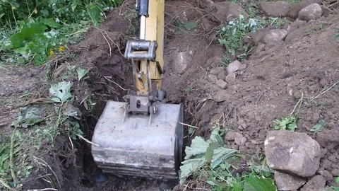 Excavator digging a deep trench, Stock Footage 78704738