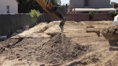 Excavator digging dirt at construction site Stock-Footage 228794757