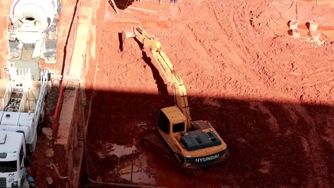 Excavator digging up dirt Stock Footage 293512223
