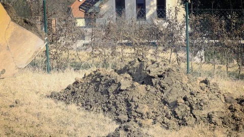 Excavator is digging foundations. Construction machinery, ground works Видео 87533947