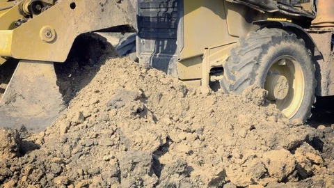 Excavator is digging foundations. Construction machinery, ground works Stock Footage 87534719