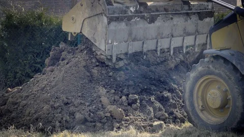 Excavator is digging foundations. Construction machinery, ground works Видео 87776217