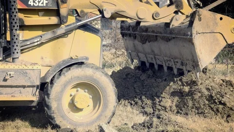 Excavator is digging foundations. Construction machinery, ground works Vídeo Stock 88526735
