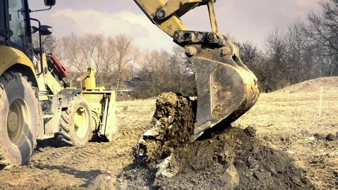 Excavator is digging foundations. Construction machinery, ground works Vídeo Stock 88531056