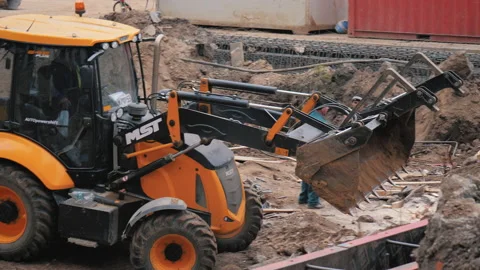 Excavator digging the ground on a Construction Site. Stock Footage 158238393
