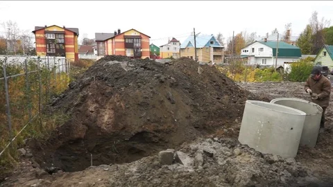 Excavator Digging Hole to Make a Pit Stock Footage 71331503