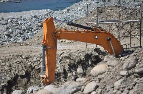 Excavator digging a hole Stock Photos