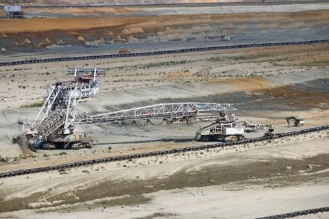 Excavator digging on open pit coal mine 스톡 사진