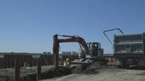 Excavator digging a pit Stock Footage 65053086