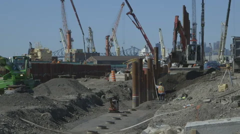 Excavator digging a pit for foundation piles Video stock 65052503