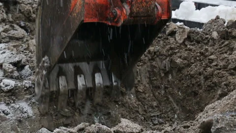 Excavator digging a pit to repair the pipeline and laying of new pipes for trans Stock Footage 199487568