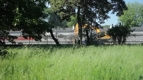 Excavator Digging A Road Stock Footage 91699564