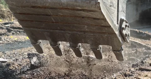 Excavator Digging Up Road Surface, Road construction and demolition, Excavator Stock Footage 334021356
