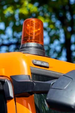 Excavator digging rotating light Stock Photos