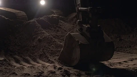 Excavator Digging Sand And Dust Working During Road Works At Night, Close Up Stock Footage 73495302