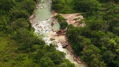 Excavator digging sand from river in amazon rainforest Stock Footage 346099967