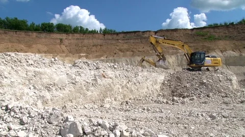 The excavator digs chalk Stock Footage 71349983