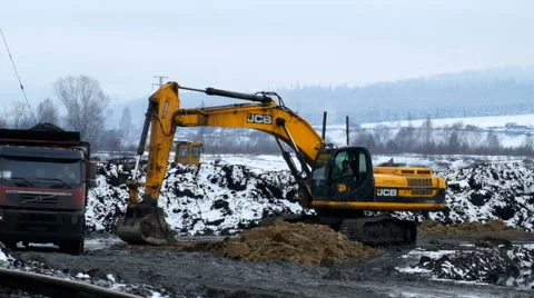 Excavator digs the ground Stock Footage 61543787