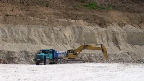 Excavator digs the ground Stock Footage 71340278