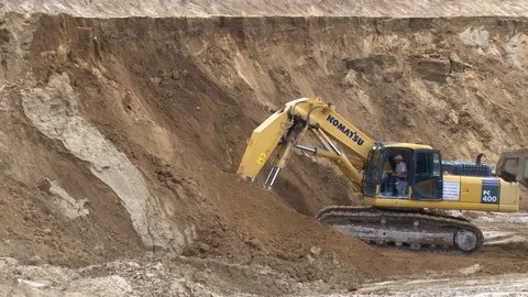 Excavator digs the ground Stock Footage 71349576