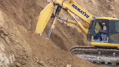 Excavator digs the ground Stock Footage 71350042