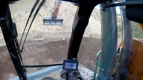 Excavator digs a hole Stock Footage 226964505