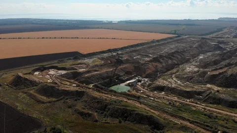 Excavator digs in quarry Stock Footage 107374010
