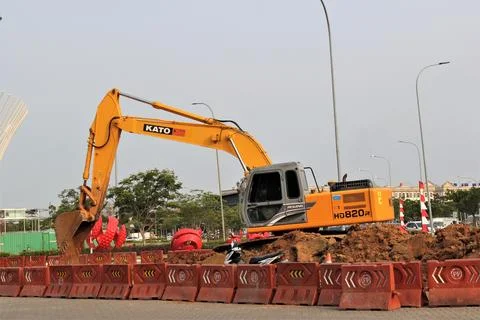 Excavator doing building construction Stock Photos