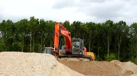 Excavator doing construction work Stock Footage 52543142