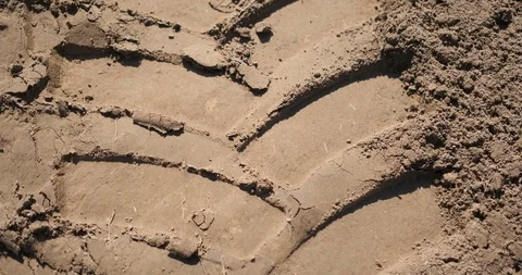 An excavator draws a tread on the ground. Stock Footage 120732589