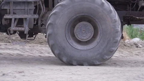 The excavator is driving. Big wheel close up. Stock Footage 101683453