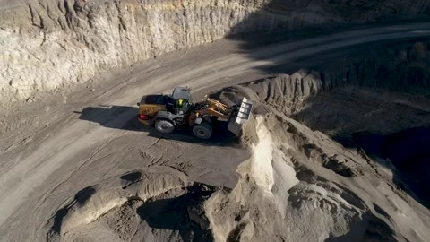 Excavator dumping sand from above (Slow Motion) Stock Footage 236567140