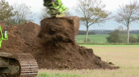 Excavator Dumps soil Stock Footage 22538289