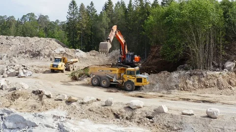 Excavator emptying scoop Stock Footage 110629764