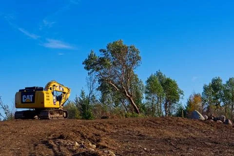 Excavator on Hill Stock Photos