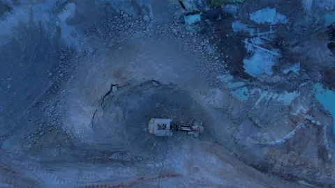 Excavator load limestone in mining truck in open pit mine. 스톡 동영상 186479915