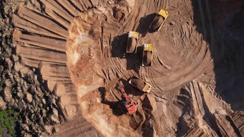 Excavator load sand in mining truck. Mining Excavator in open pit. 動画素材 195811491