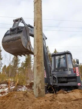 Excavator loader hydraulic tractor  digging Stock Photos