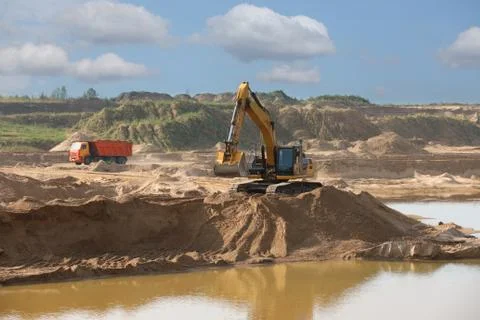 Excavator loader machine during earthmoving works Fotos Stock