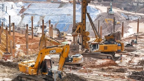 Excavator loader at soil moving works in construction site. Видео 90071384