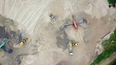 Excavator loader working at sand mine. Mining conveyor at industrial park. Mi Stock Footage