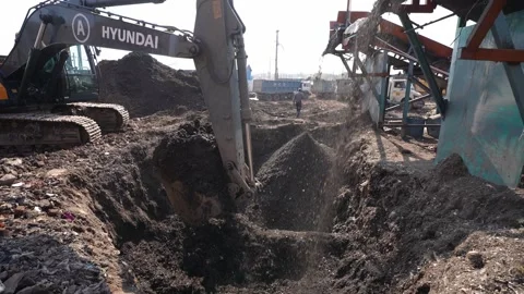 Excavator Loading Garbage Into Waste Screening Plant At Delhi Landfill Stock Footage 248058610