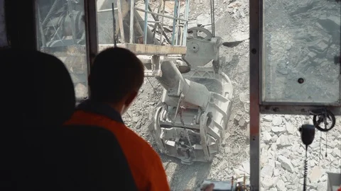 Excavator loading iron ore from the driver’s cab Stock Footage 116775116