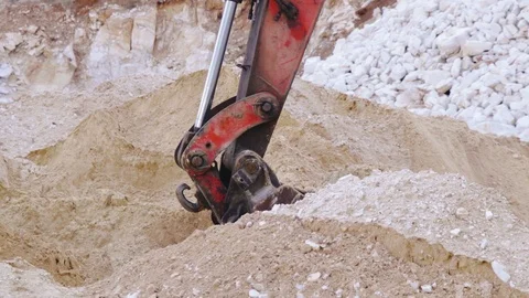 Excavator loading sand in a mine. Stock Footage 123180160