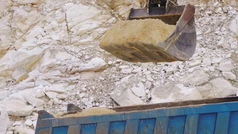 Excavator loading sand in a mine. Stock Footage 123180204