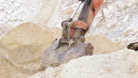 Excavator loading sand in a mine. Stock Footage 123180344